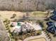 Aerial view of the estate showcasing the sprawling grounds, stunning pool, and meticulously landscaped yard at 4202 Links Ct, North Charleston, SC 29420