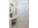 An elegant bathroom featuring a curved vanity table and ample storage for a luxurious and organized space at 4202 Links Ct, North Charleston, SC 29420