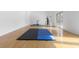Spacious home gym with exercise equipment and natural light, promoting a healthy lifestyle at 4202 Links Ct, North Charleston, SC 29420