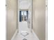 Hallway view leading to a bedroom with an outdoor balcony at 4202 Links Ct, North Charleston, SC 29420