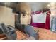 Home theater with tiered seating, projector screen, and accent lighting for an immersive viewing experience at 4202 Links Ct, North Charleston, SC 29420