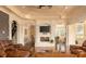 Elegant living room featuring a fireplace, arched doorways, and hardwood floors at 4202 Links Ct, North Charleston, SC 29420