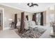 Spacious main bedroom with a canopy bed, zebra rug, and private balcony at 4202 Links Ct, North Charleston, SC 29420