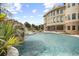 Backyard pool area with a rock waterfall feature near the beautiful home at 4202 Links Ct, North Charleston, SC 29420