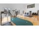 Large recreation room with gym equipment and patio access at 4202 Links Ct, North Charleston, SC 29420