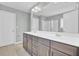 Bathroom with double sink vanity, large mirror, and walk-in shower in the background at 422 Sanders Farm Ln, Charleston, SC 29492