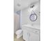 Farmhouse style bathroom with white vanity, round mirror, ship lap walls, and tub/shower combo with neutral colored shower curtain at 422 Sanders Farm Ln, Charleston, SC 29492
