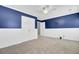 Bedroom featuring carpeted floors, two closets, and white wainscotting at 422 Sanders Farm Ln, Charleston, SC 29492