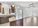 Modern kitchen featuring stainless appliances, dark cabinets, and island with hardwood floors at 422 Sanders Farm Ln, Charleston, SC 29492