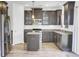 Modern kitchen with stainless steel appliances, dark cabinets, subway tile backsplash at 422 Sanders Farm Ln, Charleston, SC 29492