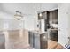 Modern kitchen with island, stainless steel appliances, and hardwood floors in open space at 422 Sanders Farm Ln, Charleston, SC 29492