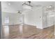 Spacious living area with hardwood floors, ample lighting, and an open floor plan at 422 Sanders Farm Ln, Charleston, SC 29492