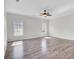 Bright, empty living area showcases hardwood floors, recessed lighting and ceiling fan at 422 Sanders Farm Ln, Charleston, SC 29492