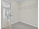 Empty walk in closet with neutral paint, wire shelving and carpet at 422 Sanders Farm Ln, Charleston, SC 29492