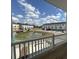 Balcony view of street and pond in neighborhood at 5124 Double Eagle, Summerville, SC 29485