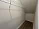 Closet or storage space with built-in wire shelving and wood-look flooring at 5124 Double Eagle, Summerville, SC 29485