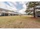 Wide shot of backyard with grassy field at 522 Truman Dr, Goose Creek, SC 29445