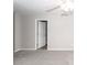 This cozy bedroom features neutral carpet, a ceiling fan, and an open doorway at 522 Truman Dr, Goose Creek, SC 29445
