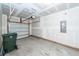 Spacious garage with an automatic door opener, concrete floors, and ample room for storage at 522 Truman Dr, Goose Creek, SC 29445