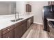 Bright kitchen featuring a stainless steel sink, modern faucet, and stainless steel appliances at 522 Truman Dr, Goose Creek, SC 29445