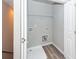 Bright laundry area offers convenience with ample space and organized shelving at 522 Truman Dr, Goose Creek, SC 29445