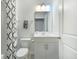 Clean, modern bathroom with black and white shower curtain and modern fixtures at 532 Fern Tree Dr, Summerville, SC 29486