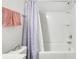 Clean, white bathroom with tub/shower combination and a decorative shower curtain at 532 Fern Tree Dr, Summerville, SC 29486