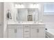 Bright bathroom featuring double sinks with vanity and countertop space and a large mirror at 532 Fern Tree Dr, Summerville, SC 29486