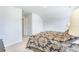 A cozy bedroom with a decorative bedspread and neutral carpet at 532 Fern Tree Dr, Summerville, SC 29486