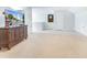 Large bonus room with neutral carpet, a television, and a dartboard at 532 Fern Tree Dr, Summerville, SC 29486