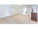 Expansive bonus room with neutral carpeting and a glimpse of adjoining room at 532 Fern Tree Dr, Summerville, SC 29486