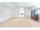 Bright bonus room with neutral carpeting, a television, and a glimpse into an adjacent room at 532 Fern Tree Dr, Summerville, SC 29486