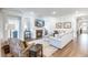 Spacious living room featuring a fireplace, hardwood floors, and an open layout to other areas of the home at 532 Fern Tree Dr, Summerville, SC 29486