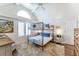 Bedroom with a bunk bed, vaulted ceilings, and a large window for natural light at 65 Ocean Point Dr, Isle of Palms, SC 29451