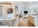 Beautiful open concept, where the dining room and kitchen seamlessly blend into the bright living room at 65 Ocean Point Dr, Isle of Palms, SC 29451