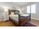 Comfortable main bedroom with king bed, rug and ample natural light at 65 Ocean Point Dr, Isle of Palms, SC 29451