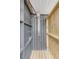 Rustic outdoor shower featuring wood and dark gray finishes at 65 Ocean Point Dr, Isle of Palms, SC 29451