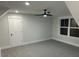 This bedroom features carpeting, a closet, natural light and an updated ceiling fan at 651 Magnolia Rd, Charleston, SC 29407