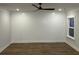 This bright, airy room is finished with shiplap accent wall and wood-look vinyl plank flooring at 651 Magnolia Rd, Charleston, SC 29407
