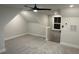 This bonus room features carpeting, lots of light, and an updated ceiling fan at 651 Magnolia Rd, Charleston, SC 29407