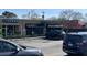Verde and Pearlz Little Oyster Bar present neighboring brick facades with parking out front at 651 Magnolia Rd, Charleston, SC 29407