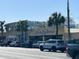 Exterior shot of Gene's Haufbrau, a historic building with large, visible signage and parked cars in front at 651 Magnolia Rd, Charleston, SC 29407