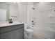Bathroom with granite countertop vanity, black fixtures, and tub-shower combo at 715 Rumbling Leaf Ln, Summerville, SC 29486