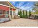 Paver patio in backyard features an outdoor kitchen, screened porch, and backyard bench at 729 Quintan St, Summerville, SC 29486