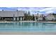 Large, community pool with slides, covered seating, and ample area for residents to enjoy at 729 Quintan St, Summerville, SC 29486
