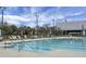 Sparkling community pool with ample seating for residents to relax and enjoy the sun at 729 Quintan St, Summerville, SC 29486