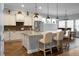 Stylish kitchen featuring granite countertops, stainless steel appliances, and a center island with seating at 729 Quintan St, Summerville, SC 29486
