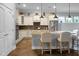 Beautiful kitchen with stainless steel appliances, granite countertops, tile flooring, and pendant lighting at 729 Quintan St, Summerville, SC 29486
