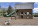 A community playhouse with a slide and toy spring rider provides recreational options at 729 Quintan St, Summerville, SC 29486