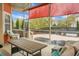 Screened in porch with outdoor seating and a view of the backyard at 729 Quintan St, Summerville, SC 29486